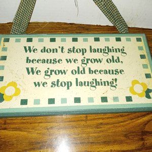 PLAQUE 11x8.5" We don't stop laughing because we grow old we grow old